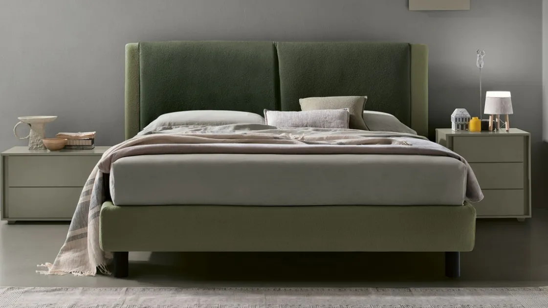 Tomasella's Gemini fabric upholstered bed.