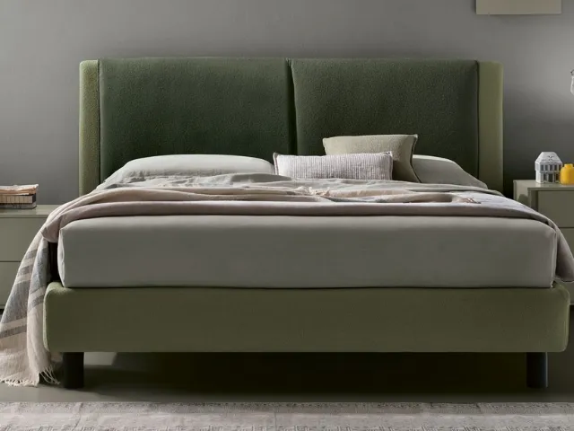 Tomasella's Gemini fabric upholstered bed.