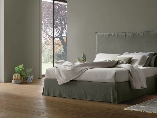 Bed with padded fabric headboard Hera by Tomasella.