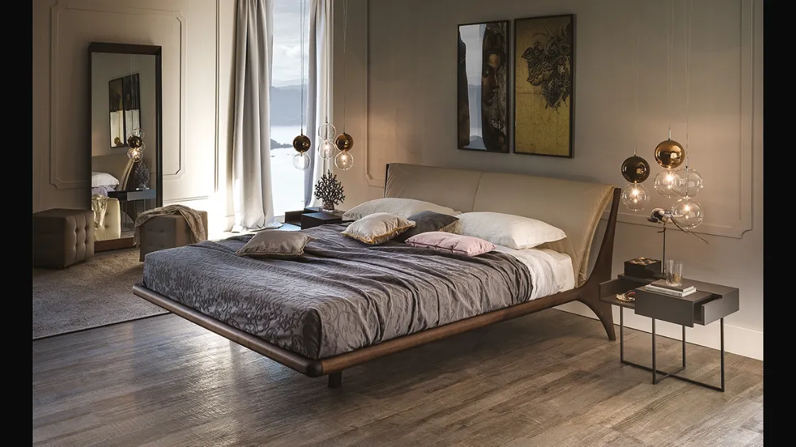 Nelson wooden bed with padded headboard by Cattelan Italia.