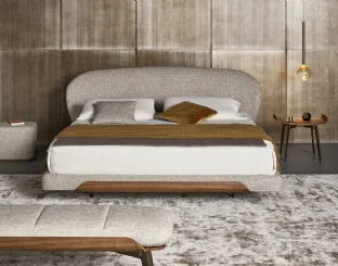 Bed with Olos headboard by Bonaldo.