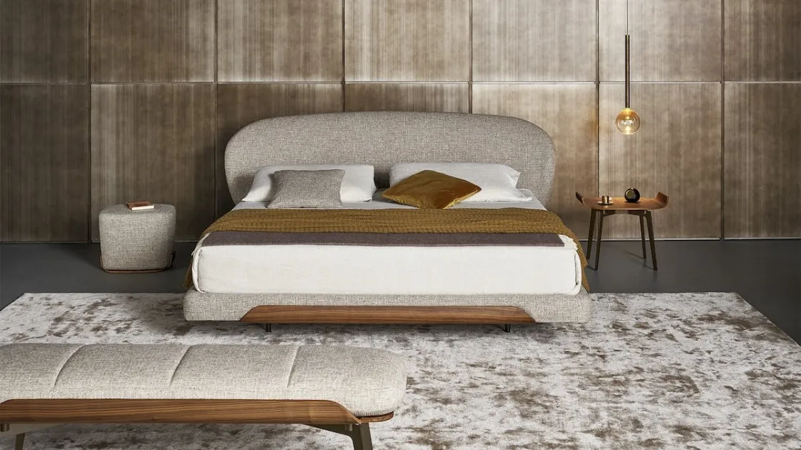 Bed with Olos headboard by Bonaldo.