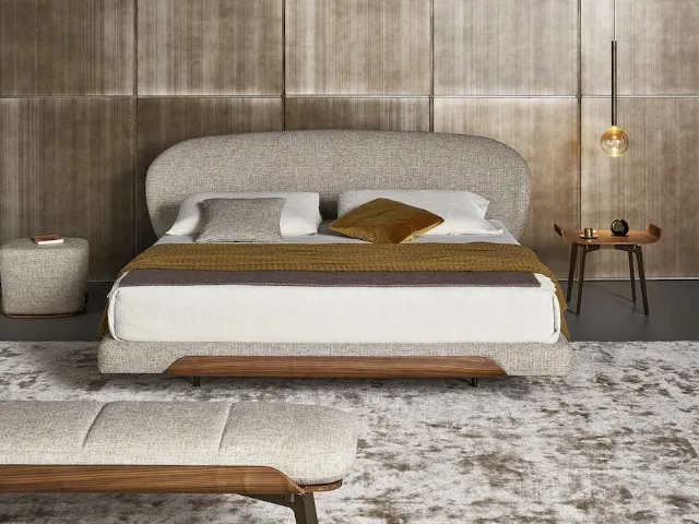 Bed with Olos headboard by Bonaldo.