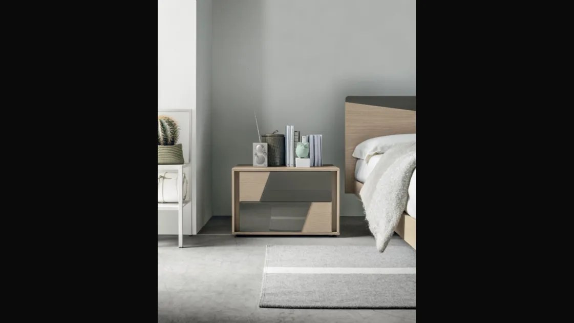 Kross bedside table in textured material with glass inserts by Tomasella.