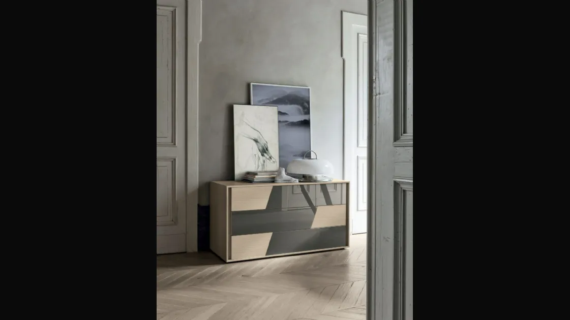 Tomasella's Kross dresser in textured material with glass inserts.